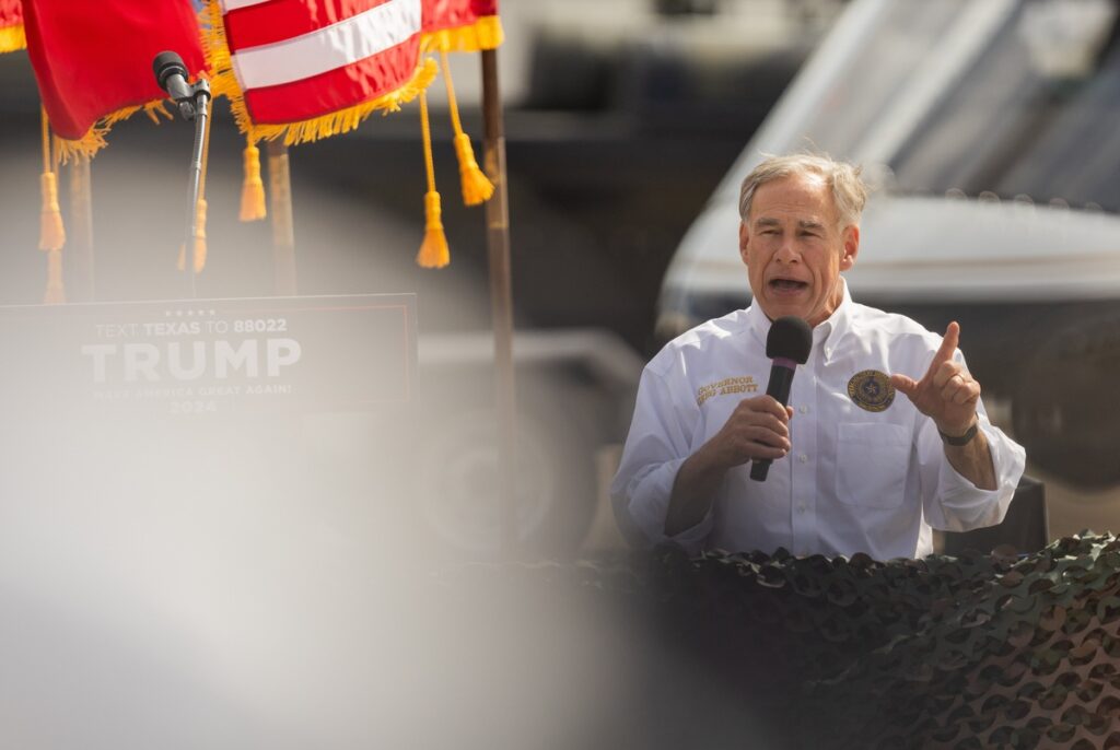 Gov. Greg Abbott jumps out of plane with 106-year-old World War II vet