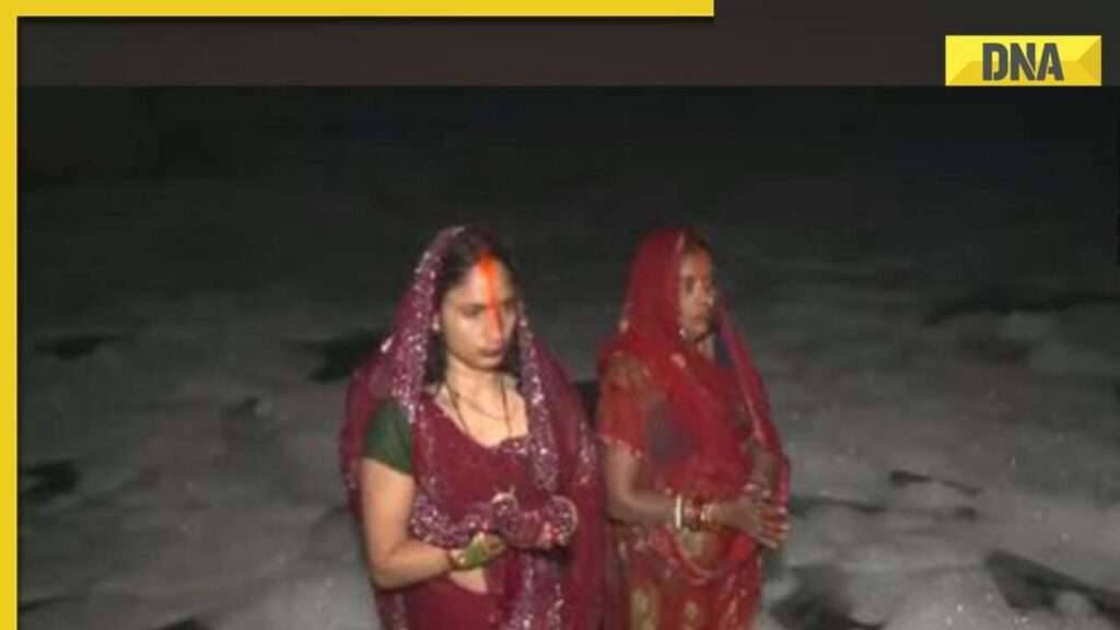 Delhi: Devotees stand in knee-deep toxic foam in Yamuna for Chhath Puja