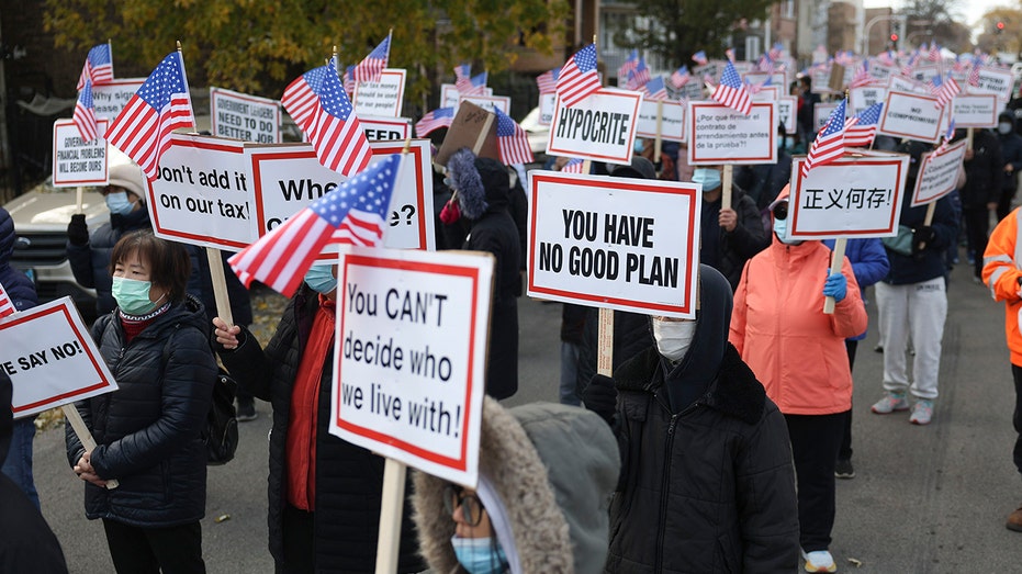 Chicago residents rail against planned migrant shelter