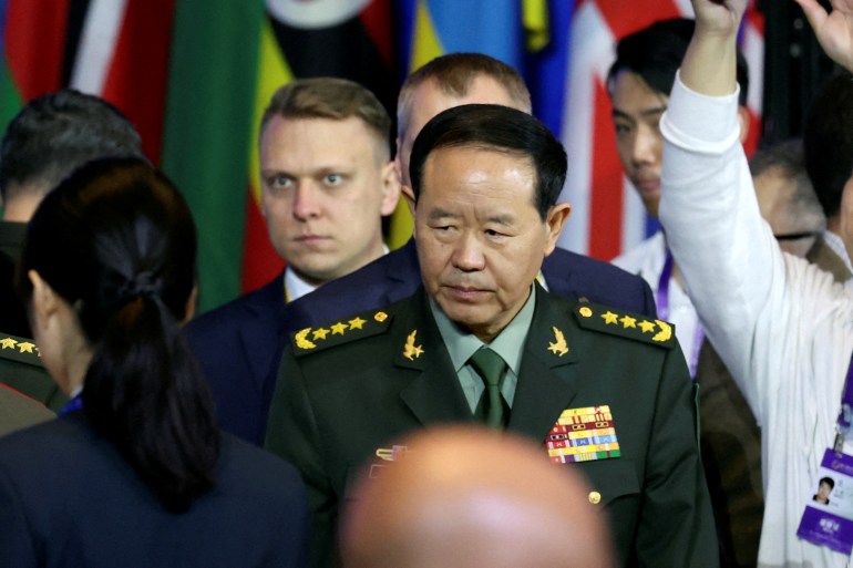 US, China top military officials hold first talks in more than a year