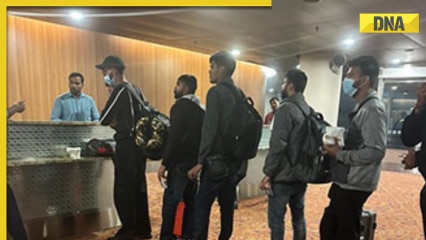 CISF personnel interrogate Indian passengers implicated in alleged trafficking scam