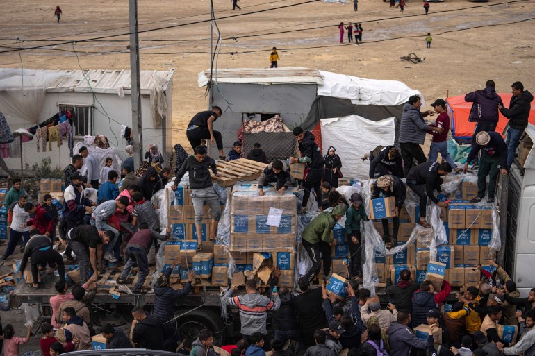 Starving Palestinians loot aid trucks as desperation mounts in Gaza’s Rafah
