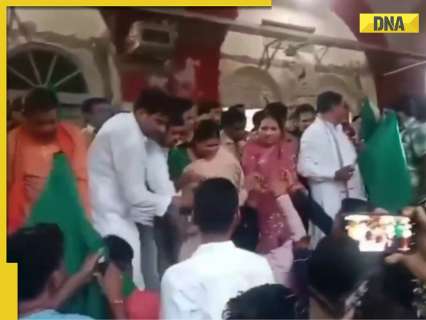 Watch: BJP MLA has near escape after falling on to railway track during Vande Bharat flag off Watch: BJP MLA has near escape after falling on to railway track during Vande Bharat flag off