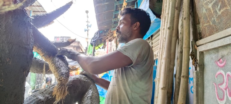 Sombre mood after a Kolkata rape and murder dampens Durga Puja celebrations Sombre mood after a Kolkata rape and murder dampens Durga Puja celebrations