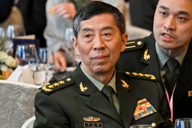 China says top military official suspended, placed under investigation