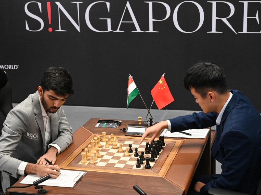 World chess champ Ding and teen challenger Gukesh tied past halfway mark World chess champ Ding and teen challenger Gukesh tied past halfway mark
