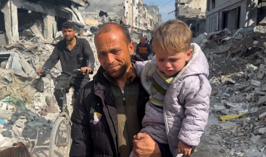 Palestinian father reunites with his lost baby after a year of war Palestinian father reunites with his lost baby after a year of war