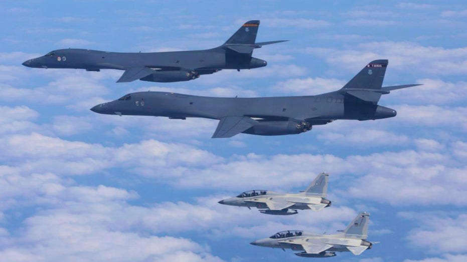 US flies joint patrol with the Philippines near shoal region guarded by China US flies joint patrol with the Philippines near shoal region guarded by China