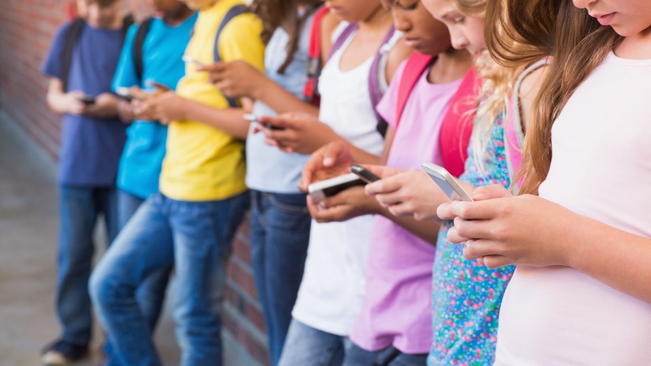 Teens spend more than a quarter of their time at school on phones, new study finds Teens spend more than a quarter of their time at school on phones, new study finds