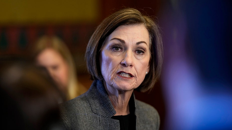 Iowa governor signs bill removing transgender protections from civil rights code Iowa governor signs bill removing transgender protections from civil rights code