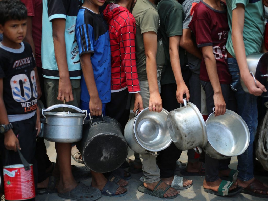 US-backed GHF says Gaza aid sites remain shut as Israeli attacks kill 22