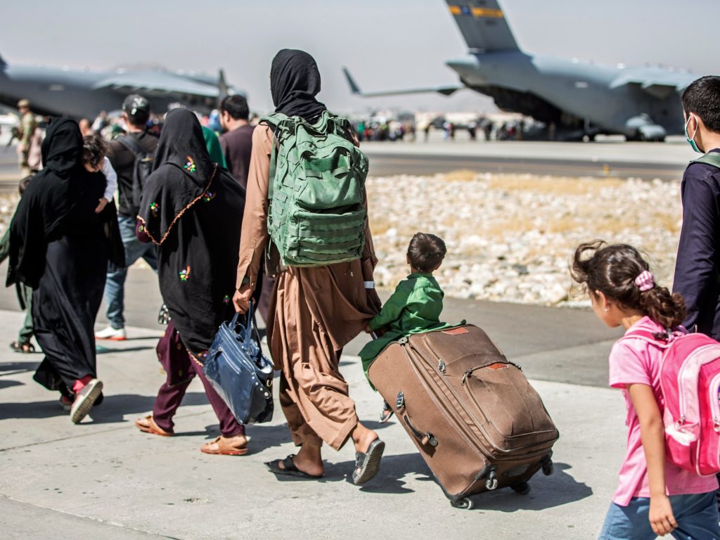 Afghans in US mark Taliban Kabul takeover amid Trump immigration crackdown