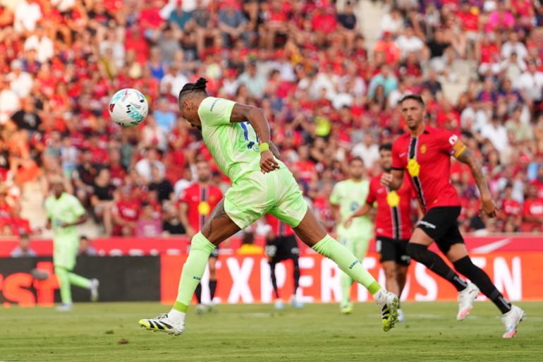 Barcelona begin La Liga title defence with win at Mallorca