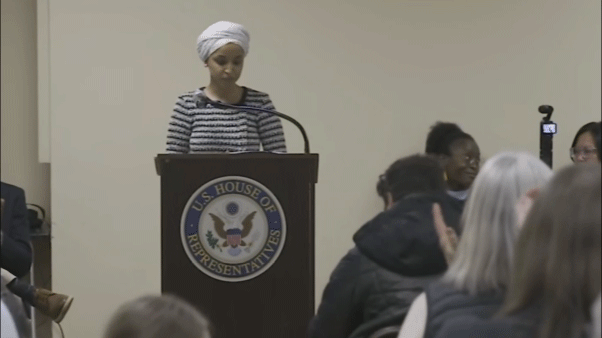 Ilhan Omar sprayed by unknown substance after man charges her at Minneapolis town hall Ilhan Omar sprayed by unknown substance after man charges her at Minneapolis town hall