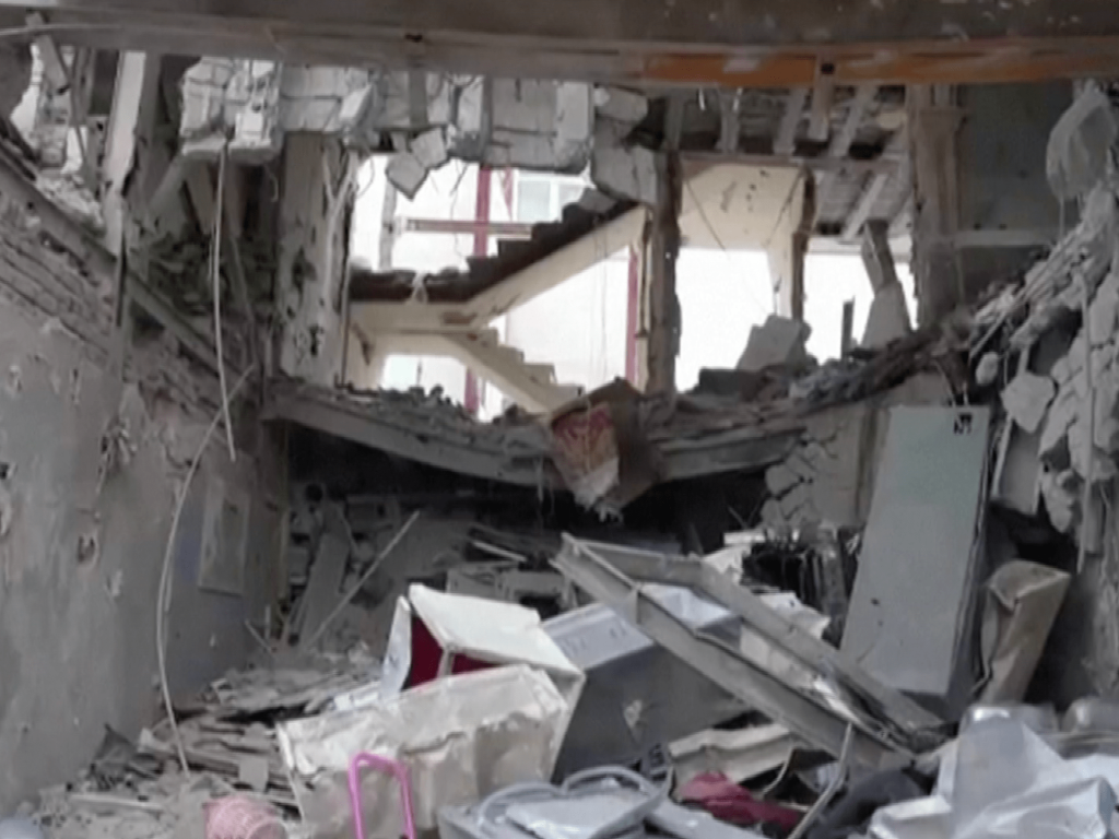 Immense damage seen in Iran’s streets after air strikes