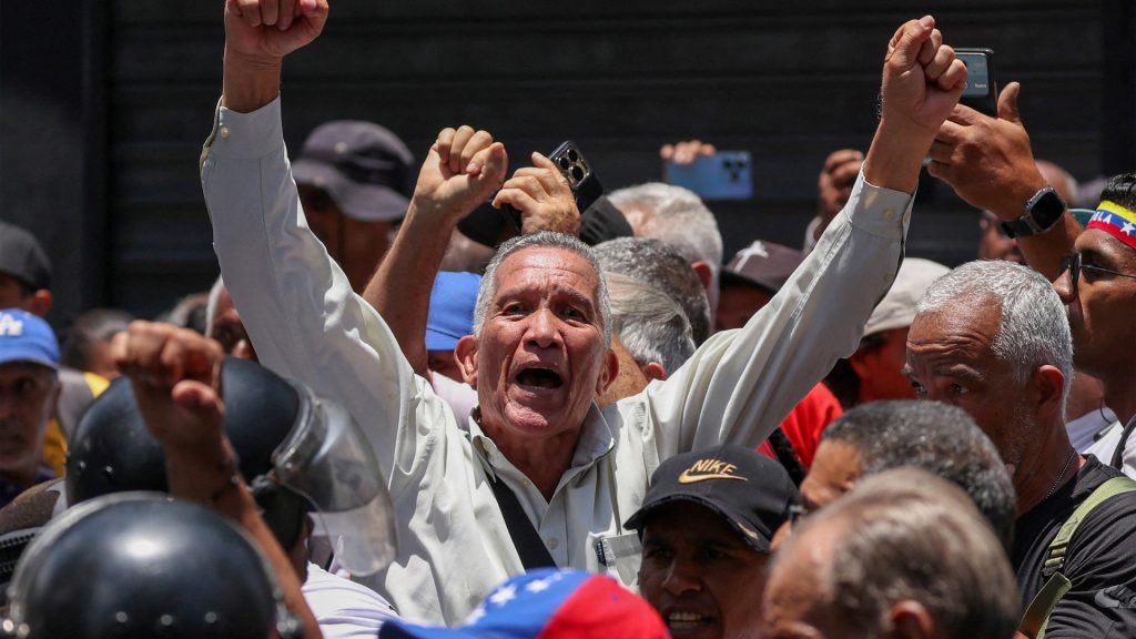 Riot police push back protesters demanding higher wages in Venezuela Riot police push back protesters demanding higher wages in Venezuela