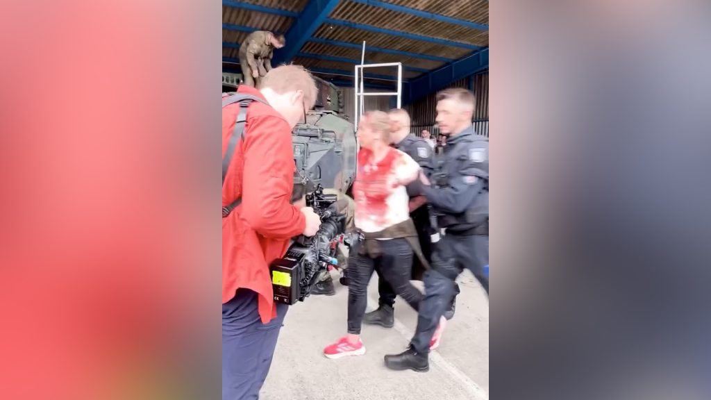 Activists disrupt German military exhibit over arms sales to Israel Activists disrupt German military exhibit over arms sales to Israel