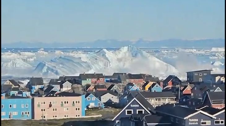 Massive iceberg capsizes off the coast of Greenland Massive iceberg capsizes off the coast of Greenland