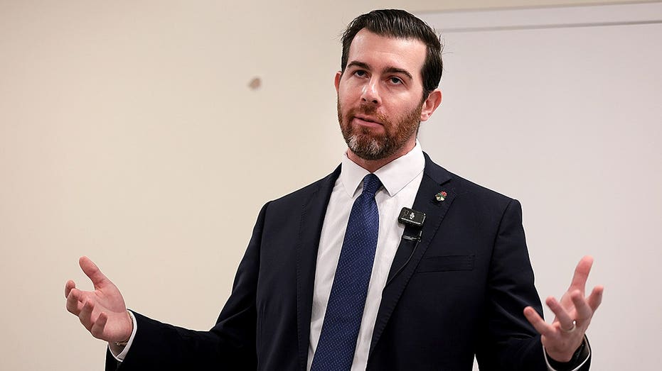 Socialist in Trump country gives Karl Marx vision thumbs-up before ducking key tax question Socialist in Trump country gives Karl Marx vision thumbs-up before ducking key tax question