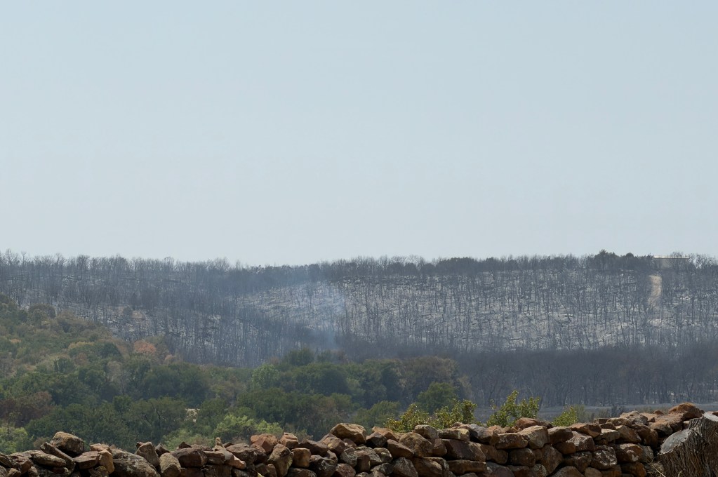 Fire crews fully contains North Texas wildfire, which continues to burn three weeks later