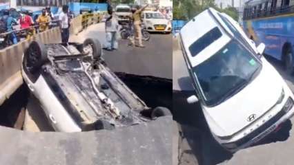 Chennai Shocker: Car plunges into 10-foot Sinkhole near tidel park; Watch Video Chennai Shocker: Car plunges into 10-foot Sinkhole near tidel park; Watch Video