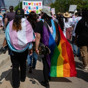 Group behind trans mailers must answer questions under oath, Travis County judge rules