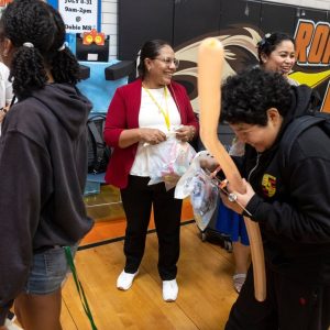 A fight to save an Austin middle school puts families at odds with Texas over how to rate schools