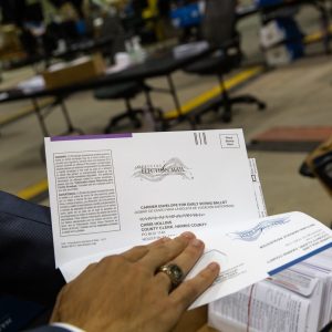 Texas’ mail-in voting rules pushed voters to cast ballots in person — or not vote at all, study