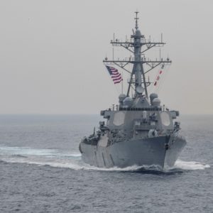 Iranian helicopter confronts US warship approaching territorial waters