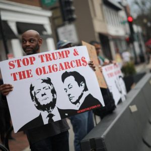 Elon Musk protesters gather at Tesla showrooms