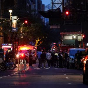 Five dead in New York city shooting, including police officer, suspect
