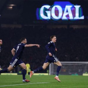 Scotland beats Denmark 4-2 to book first World Cup spot since 1998