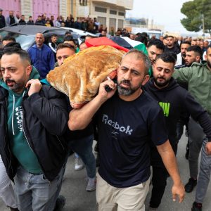 Palestinians bury four women killed in Iranian missile attack