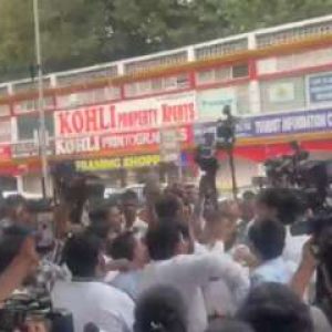 Anti-Modi Sentiments Soar: Man raising pro-PM slogans slapped at demonstration against CEC Gyanesh Kumar