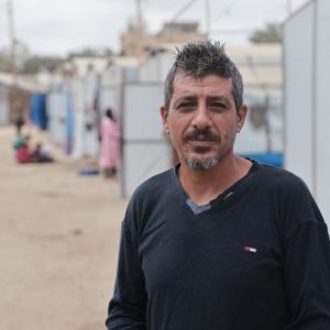 Palestinians in Gaza worry and wait for Israel to implement ceasefire