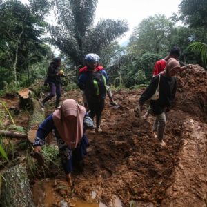 Rescuers in Indonesia search for survivors after landslide kills 19 in Java