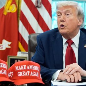 Trump says lower tariffs depend on China, as US states sue over trade war
