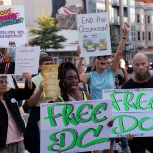 US National Guard troops begin carrying weapons in Washington, DC