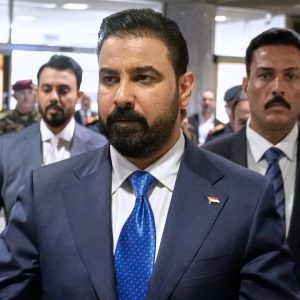 Iraqi PM heads to US seeking balance between security and economy