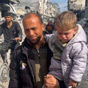 Palestinian father reunites with his lost baby after a year of war