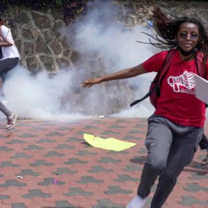 Kenyan police tear gas protesters marching against femicide