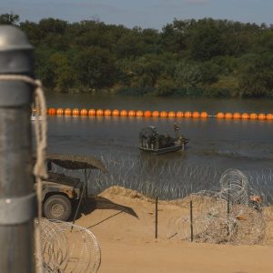 Texas’ floating barrier in the Rio Grande can stay for now, appeals court says