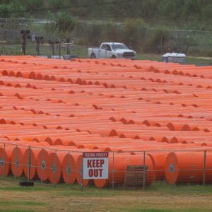 Drifting anti-immigrant buoys in Rio Grande temporarily close two bridges with Mexico
