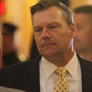Florida and Kansas are accusing 2 people of forging signatures for petition drives