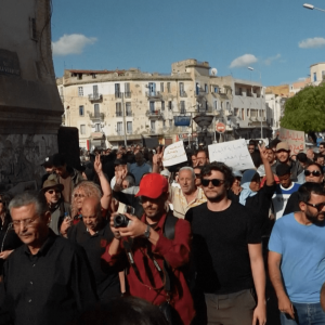 Tunisians rally amid economic crisis and political arrests