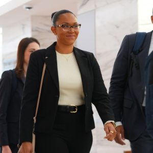 California couple confront their surrogate in a Texas court as dispute over newborn escalates