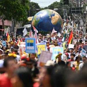 Thousands march for climate action outside COP30 summit in Brazil