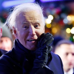 Biden attends national Christmas tree lighting on windy Washington night