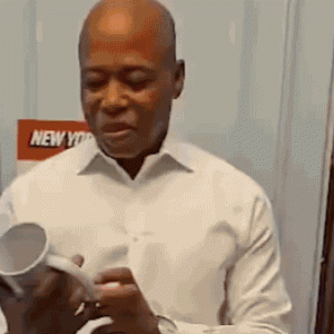 Adams reads his ‘greatest hits’ quotes from coffee mug in farewell tribute as NYC mayor