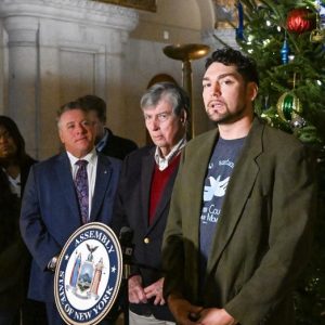 Protesters attempt to stop removal of hundreds of migrants from public-funded housing